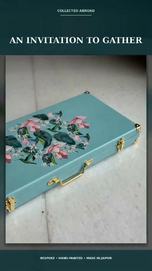 A painted garden on turquoise Assam teak; inside, hand-painted teak lacquered tiles rest in velvet, ready for the table. Nine artisans, 500 hours, and five weeks bring each bespoke Kachoe Bespoke American Mahjong set to life through a centuries-old Rajasthani painting tradition. Art to live with. A game to gather around. Collectedabroad.com

#CollectedAbroad #KachoeMahjong #AmericanMahjong #HandPainted #RajasthaniArt